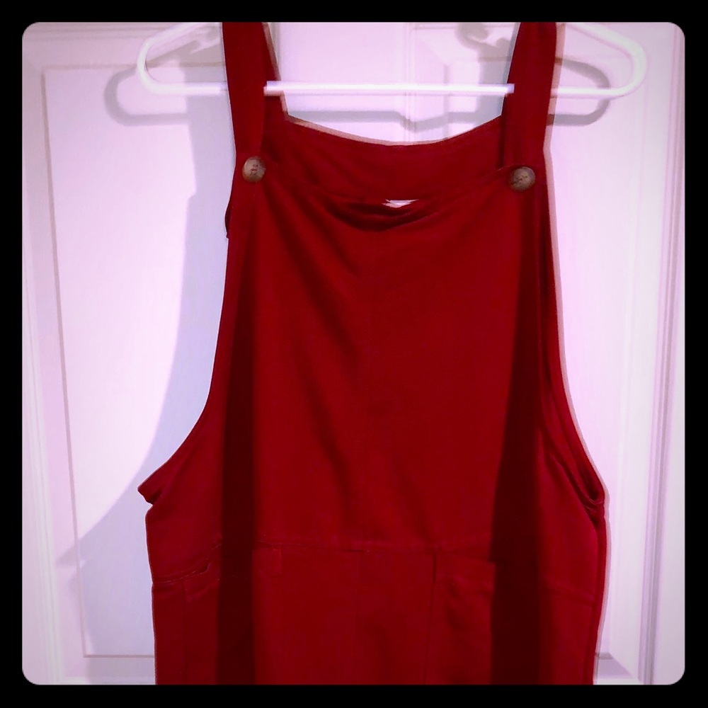 Dark red poly jumper.